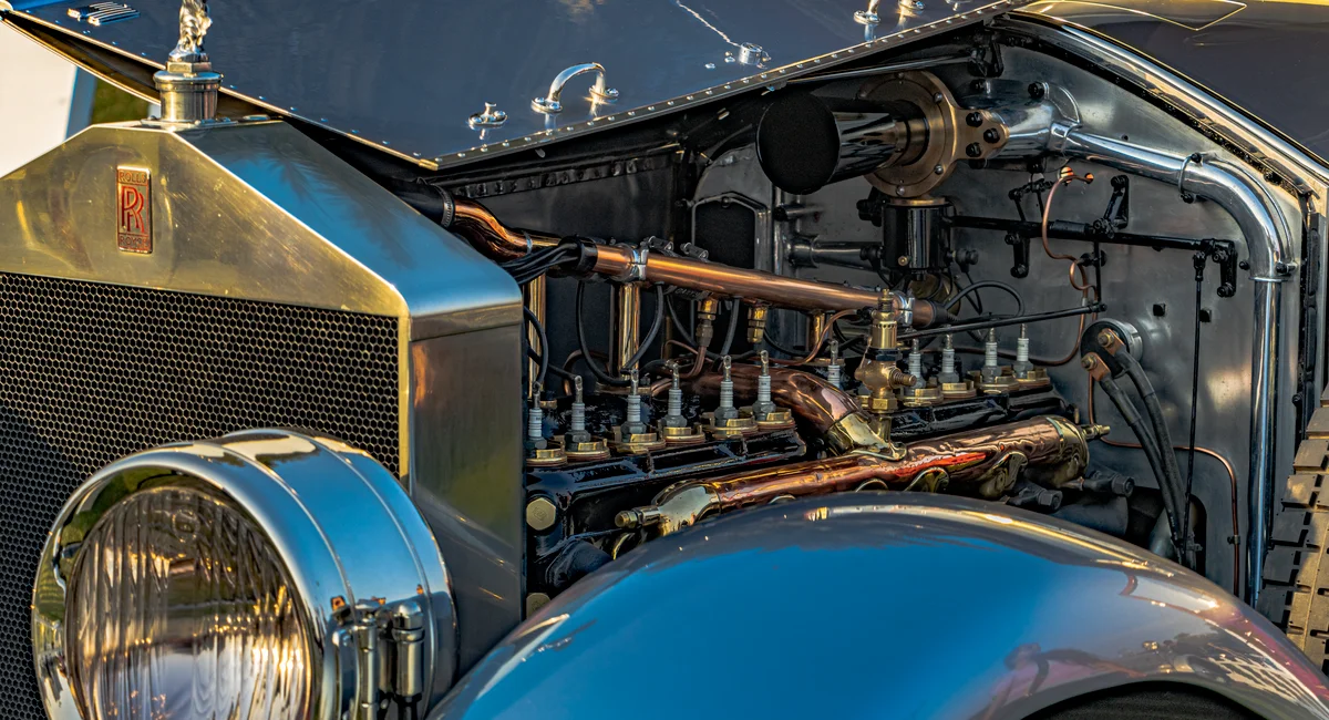 Explore the intricate details of a classic Rolls Royce engine at a car event in Gurugram, India.